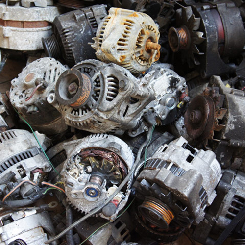 A heap of rusted alternator scrap.