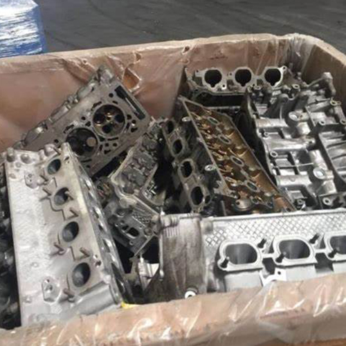 Alluminuim engine blocks kept in a cartons for recycling