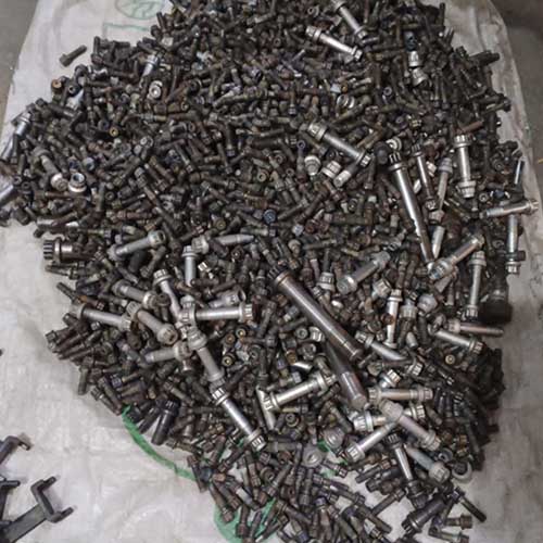 A pile of very short rod like used inconel scrap metals, Order now